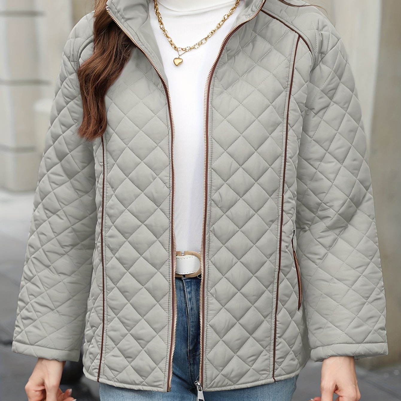 Women's plus size quilted jacket with zipper closure, polyester material, long sleeves, solid color, autumn/winter outerwear.