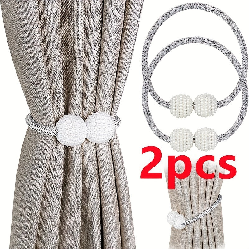 A set of magnetic curtain ties for securing curtain ropes, ideal for family home or office decor.