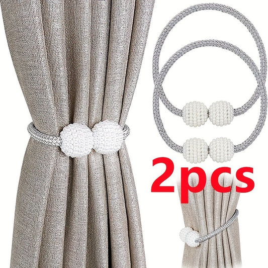 A set of magnetic curtain ties for securing curtain ropes, ideal for family home or office decor.