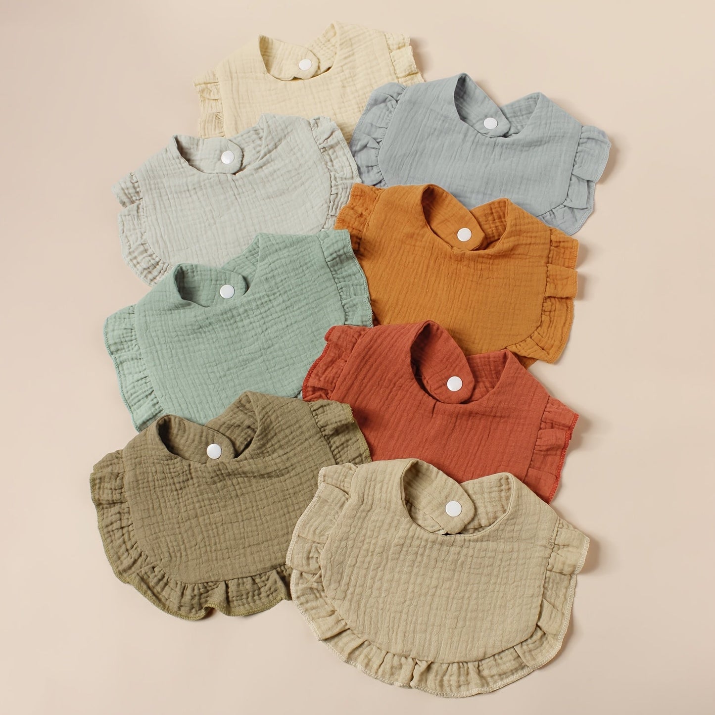 Eight pieces of 2-layer soft bibs with wrinkle-resistant and breathable fabric, ideal for feeding and keeping baby clean. These adorable cotton ruffle bibs are perfect for catching saliva and spills.