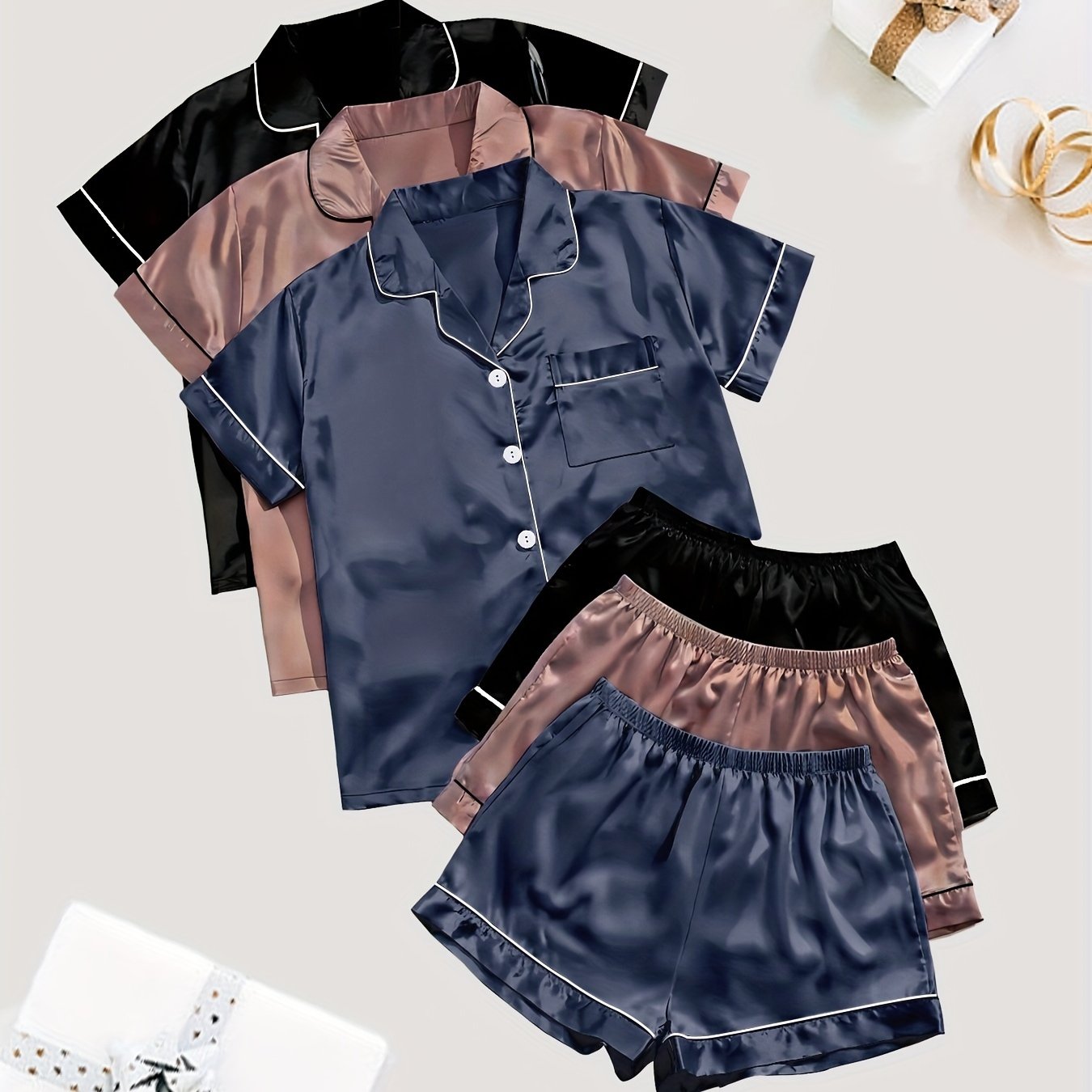 Solid satin pajamas with short sleeve button top and elastic shorts for women's sleepwear.