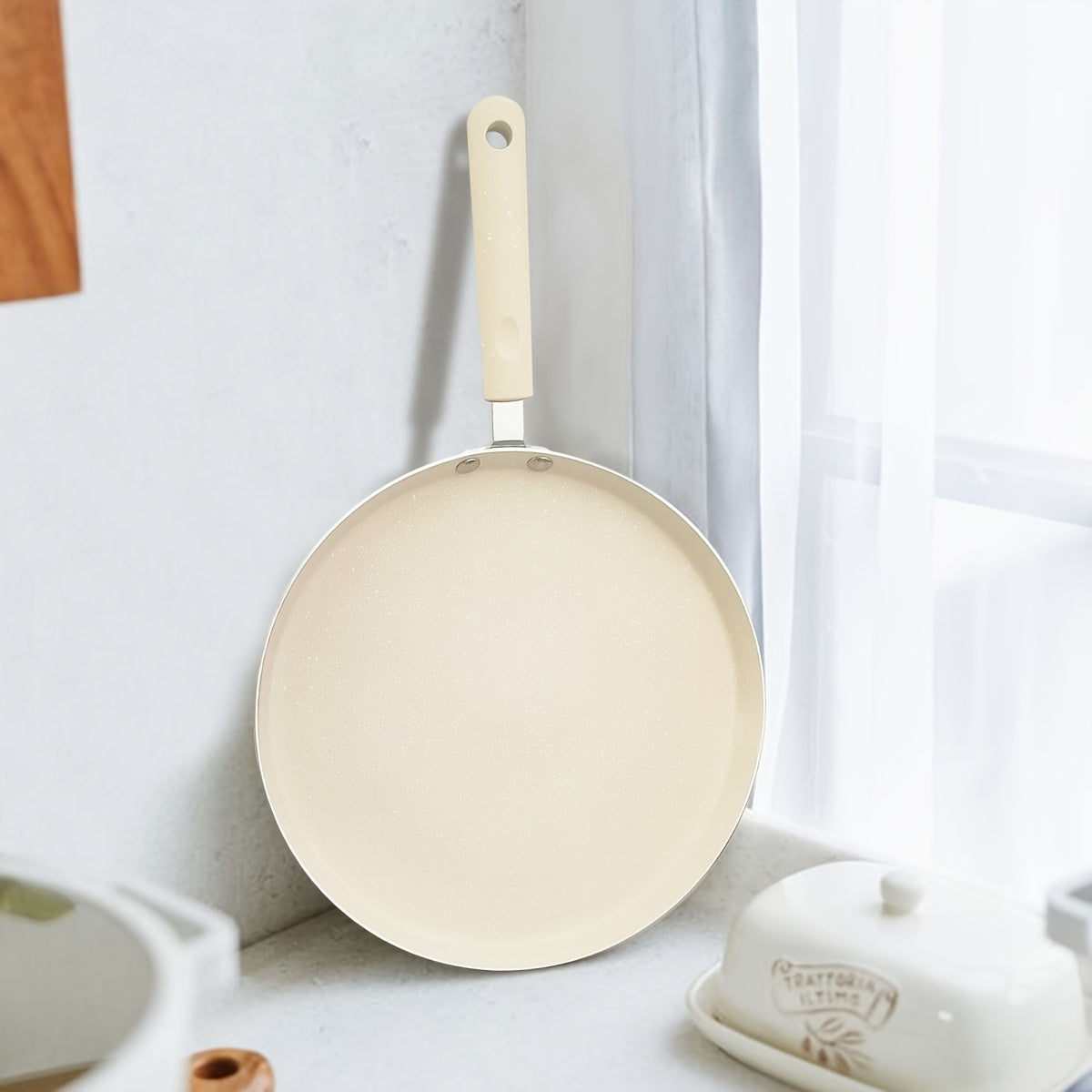 This Nonstick Crepe Pan Set features a Beige Maifan Stone construction with a durable Wooden Handle. Suitable for use on Electric Coil, Gas Stove, and Induction Cooktops, this Dishwasher Safe Aluminum Pancake Skillet does not require electricity for use.