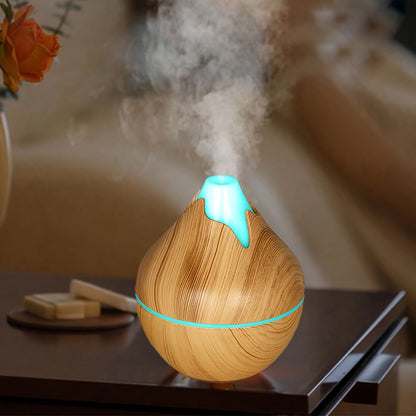 USB powered humidifier with aromatherapy, quiet operation, wood grain design, suitable for home and office.