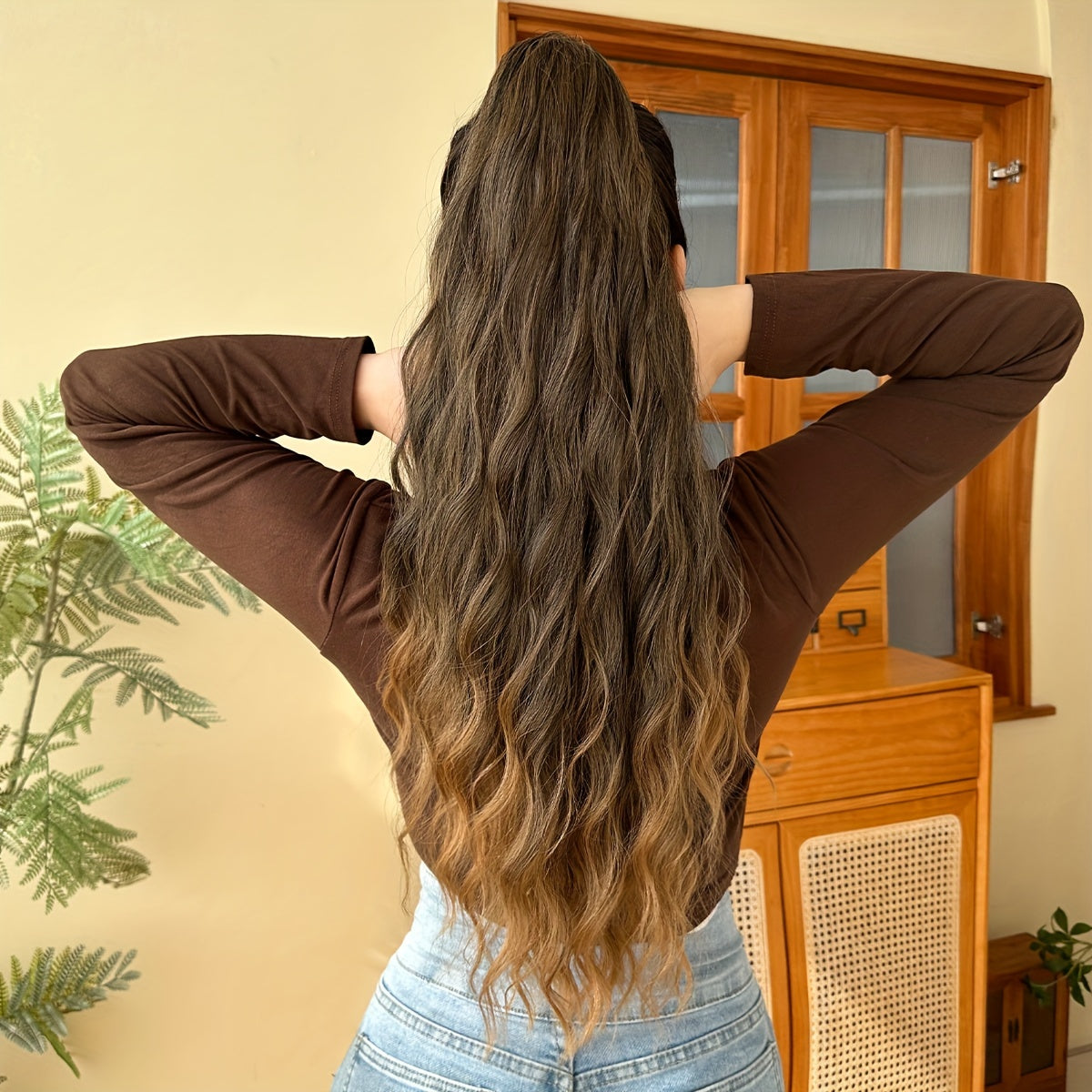 YUSULAXI Women's 24-Inch Long Wavy Drawstring Ponytail Extension made of synthetic high temperature fiber for daily use.