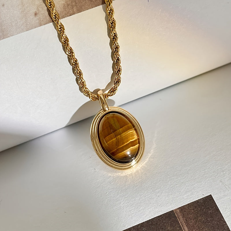 Stylish bohemian oval pendant necklace featuring Tiger Eye stone in a vintage design - Crafted from 18K gold plated titanium steel with a natural stone mosaic. Perfect for daily wear or as a special gift.