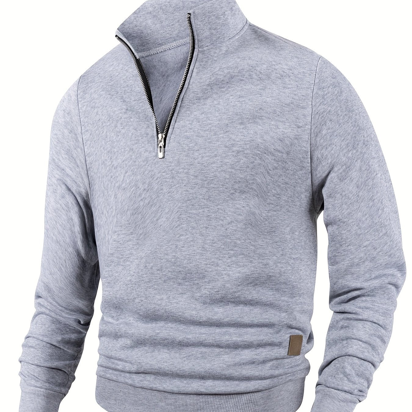 Men's casual half-zip pullover sweatshirt in solid color, made of 100% polyester knit fabric with a slight stretch. Features a stand collar, long sleeve, zipper detail, and regular fit.