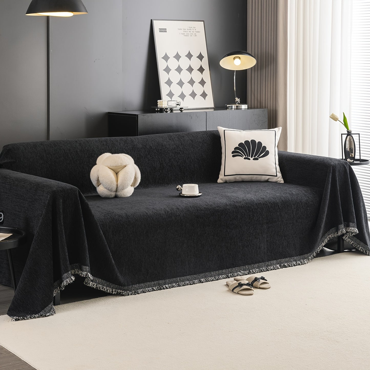 Waterproof sofa cover with tassels, washable and durable for universal furniture protection in living room home decor.