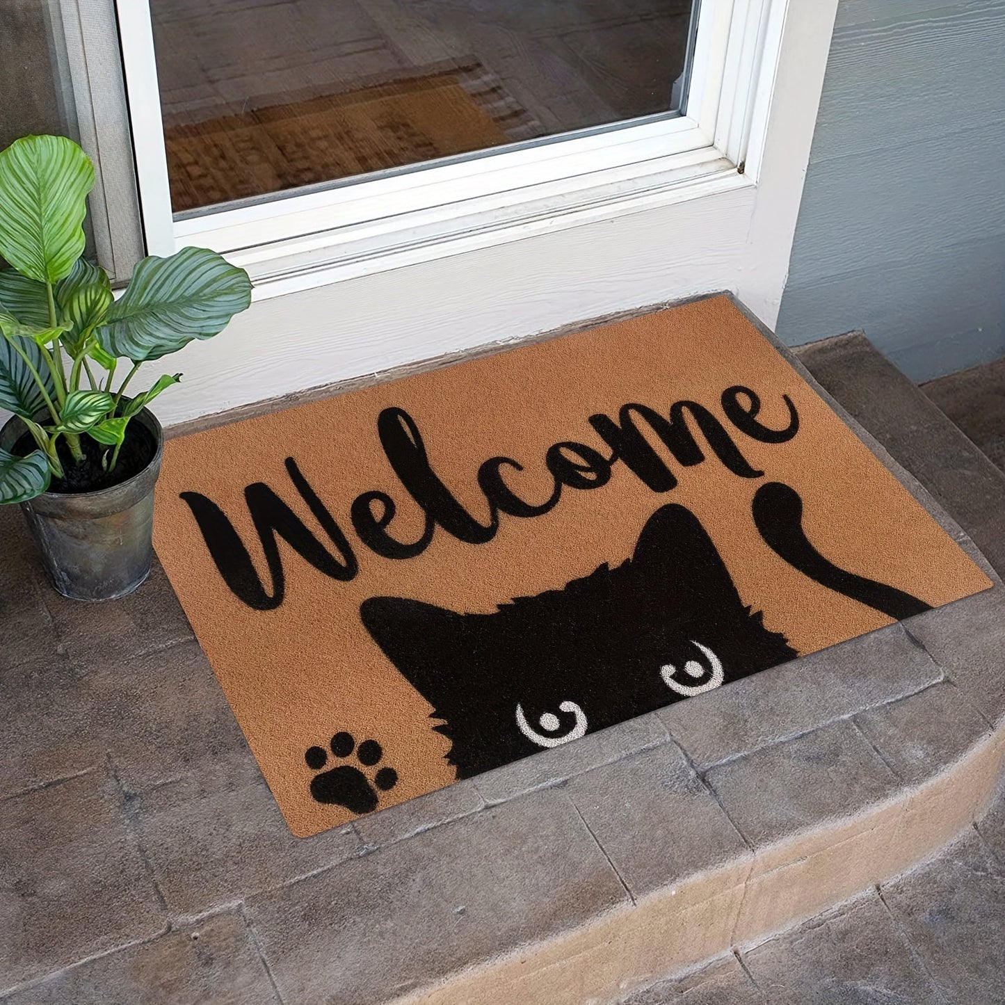 Introducing our Cat Welcome Doormat, featuring a non-slip backing for safety. Made from machine washable polyester, this indoor/outdoor rug is perfect for any entrance, porch, laundry room, or office. The fun cat design adds a whimsical touch to your