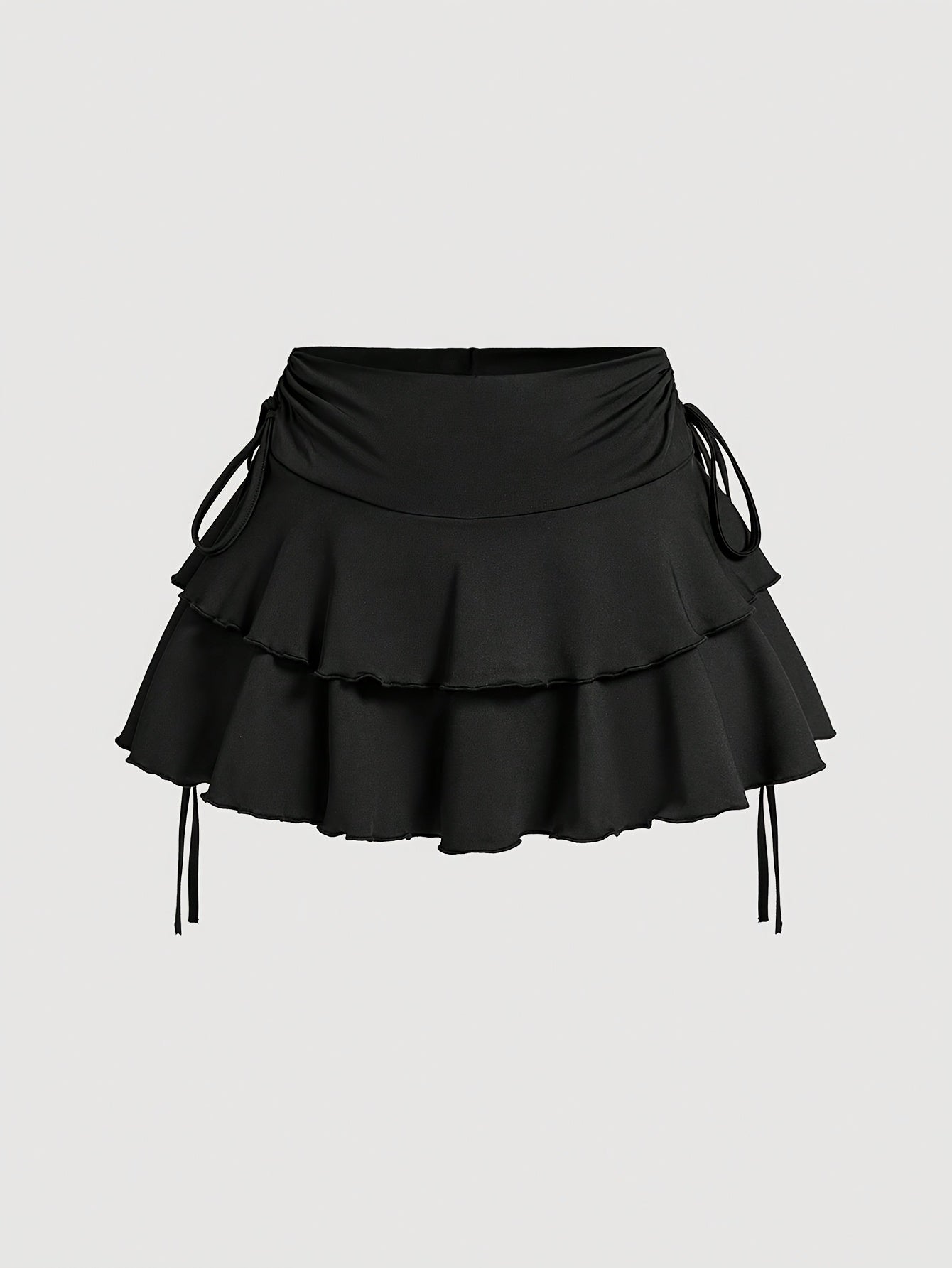 Black polyester knit outfit for spring/summer with off-shoulder top and ruffle skirt.