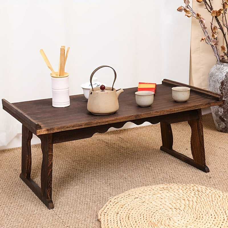 This Japanese-inspired low table is versatile and convenient for meditation, coffee, and bedside use. It features foldable legs and is made of durable Paulownia wood.