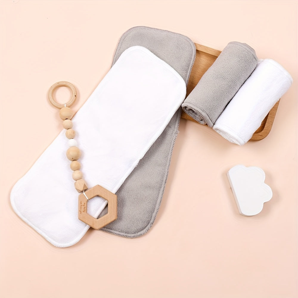 Two pieces of absorbent microfiber cloth pads, including 3-layer washable microfiber diaper inserts.