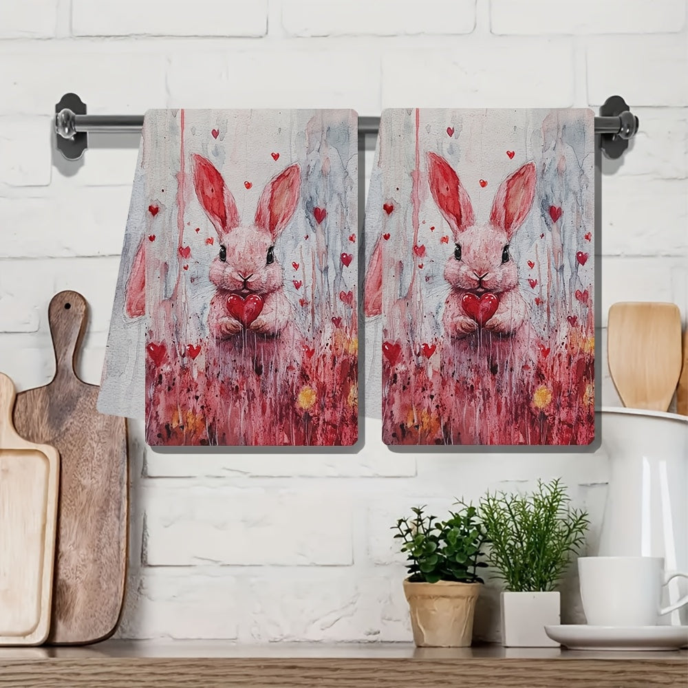 Two pieces of Valentine's Day Bunny Kitchen Towels, featuring a modern Coastal Style design. Made from highly absorbent polyester knit fabric that is machine washable. Each towel measures 40.64x60.96 cm, making them perfect for holiday decor. Item