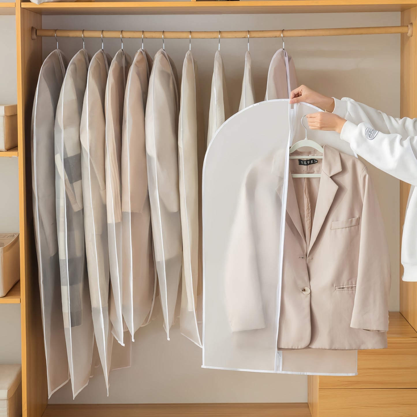 5 transparent garment dust covers for hanging clothes protection, washable and moisture-proof. Ideal for suits, dresses, and more. Visible storage solution for wardrobe organization.