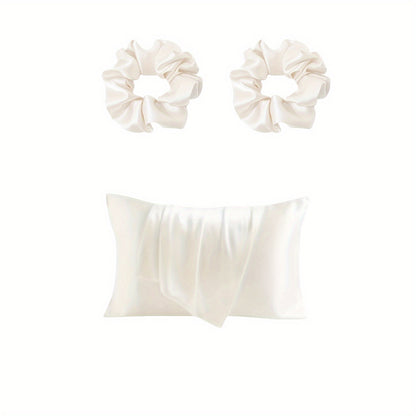 Luxurious satin pillowcase and hair scrunchies with minimalist design. Ideal for home, hotel, or bedroom use. Includes matching set of 2 scrunchies.