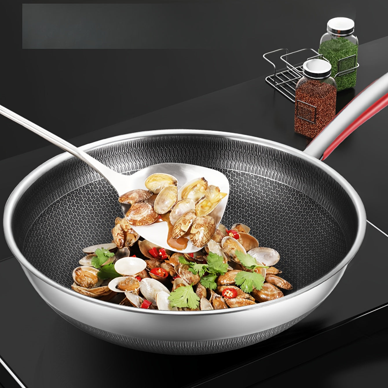 Get your hands on the versatile stainless steel wok that comes with a glass lid. This non-stick wok features a honeycomb design that ensures perfect frying and cooking every time. It is compatible with both induction and gas stoves, making it a