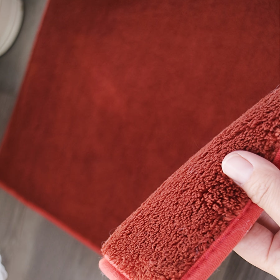 Machine-made oblong bath rug made from quick-dry absorbent knit fabric with non-slip features. Crafted from polyester fiber, this rug is 1.8cm thick and has a weight of 780gsm. Suitable for entryways, bedrooms, living rooms, and garages. Easy to care for