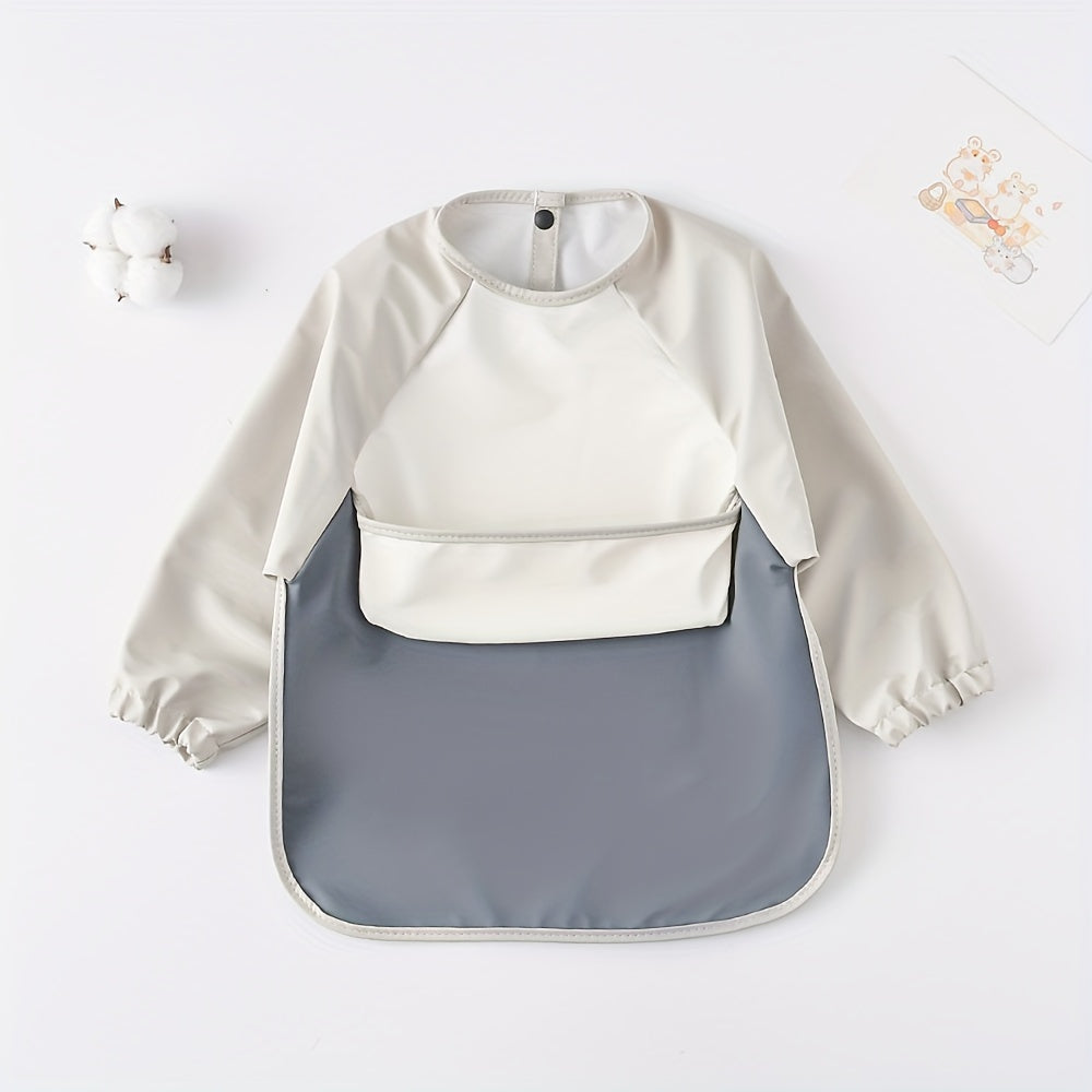 Long-sleeved reverse dressing bib for eating, with a super soft waterproof pocket for feeding.