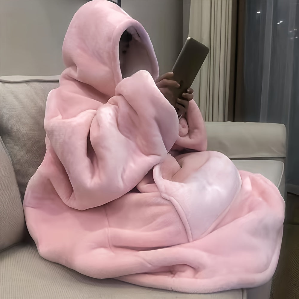 Pink Oversized Hoodie Blanket, featuring a contemporary design and made from ultra-soft Sherpa fleece. This wearable snuggle sweatshirt is reversible and has a long plush feel with a charming water otter print in a knitted patchwork design. Crafted from