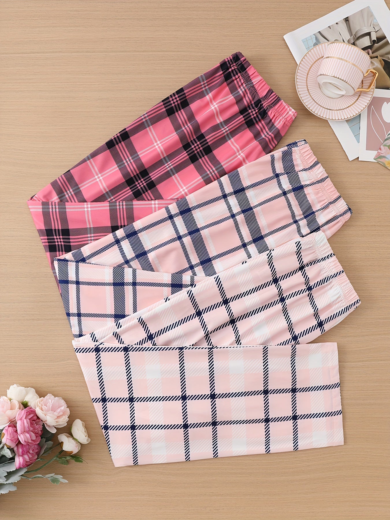 3 Casual lounge pants with plaid print, elastic high waist, and loose fit for women's sleepwear and loungewear.