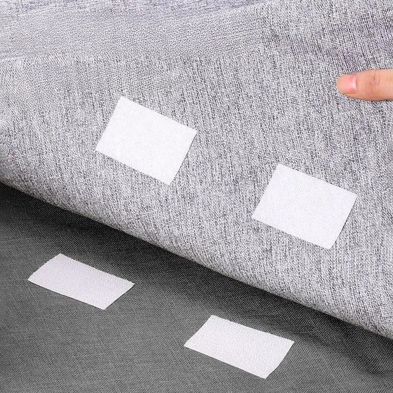 10 sets of transparent sofa cushion adhesive strips with white anti-slip backing. They are spot-clean and non-marking, suitable for fastening bed sheets and carpets in various scenarios.