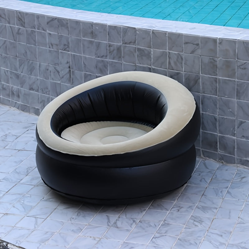 One single inflatable lazy sofa with a thickened inflatable seat, perfect for family outdoor activities. Portable armchair for relaxing in comfort.