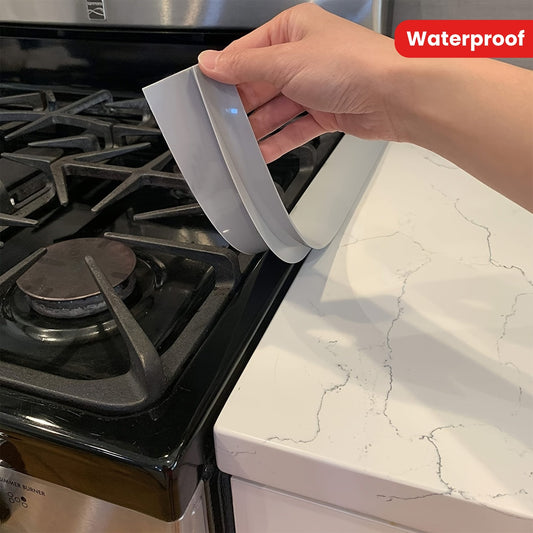 Protect your kitchen stove with the 1pc Counter Gap Cover. This anti-spill, oil and grease-proof sealing strip is perfect for gas ranges. It is easy to clean, heat-resistant, waterproof, dustproof, and blocks out dirt. Keep your home safe and clean with