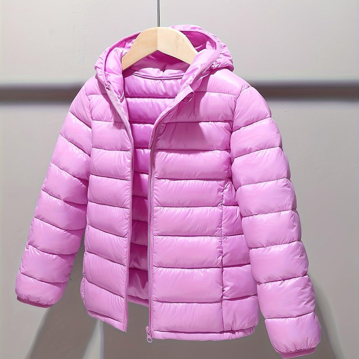 Casual and warm hooded coat for girls, perfect for autumn and winter.