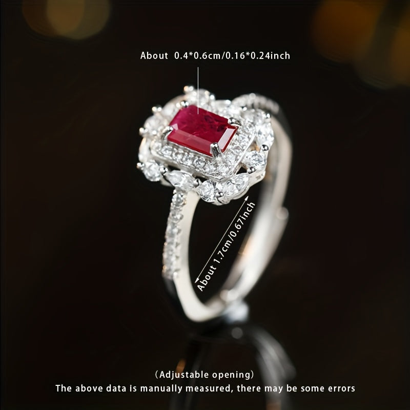 Here is the rewritten version:

"A must-have gift, this women's open ring features a natural red stone set in S925 silver. The ring is adjustable for a perfect fit and showcases the beauty of natural ore. Please note that the color and pattern of the