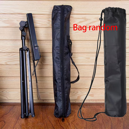 Portable folding music stand for piano, guitar, ukulele, and violin with durable alloy construction.