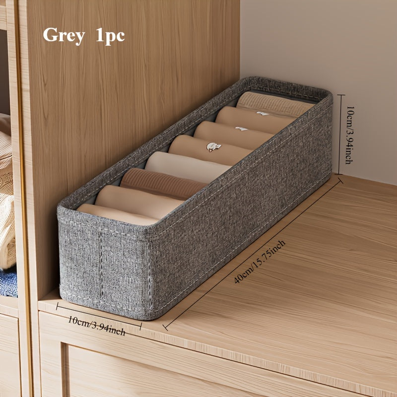 Modern Fabric Storage Box designed to hold socks, underwear, handkerchiefs, ties, and belts. This versatile and collapsible closet organizer is essential for any wardrobe. While it is not waterproof, this rectangle box can be used for outdoor storage or