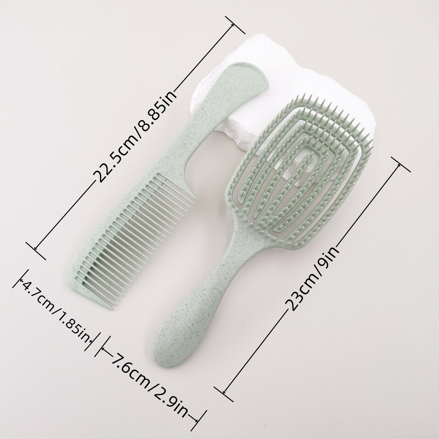 Detangling brush which comes with a large teeth comb, pressure massage hairbrush and can be used for both wet and dry hair. Made with ABS plastic handle and comes in a boxed set.