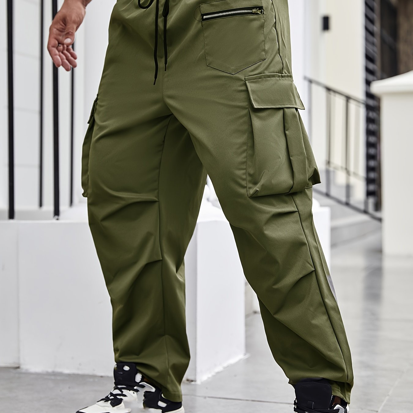 Durable polyester cargo pants for men in plus sizes, suitable for all seasons.