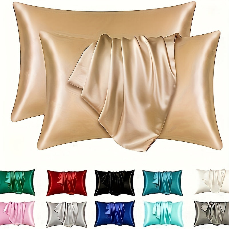 Two luxurious silky soft pillowcases with breathable and skin-friendly cooling feel. Solid color with envelope closure. Machine washable. Set of two.