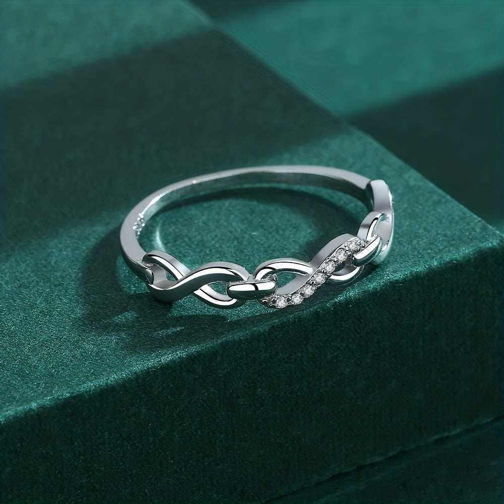 Elegant 925 Sterling Silver Ring featuring an Infinity Design and Sparkling Zirconia Stones, perfect for complementing any outfit. This high-quality piece of jewelry is a beautiful and delicate birthday gift option for women.