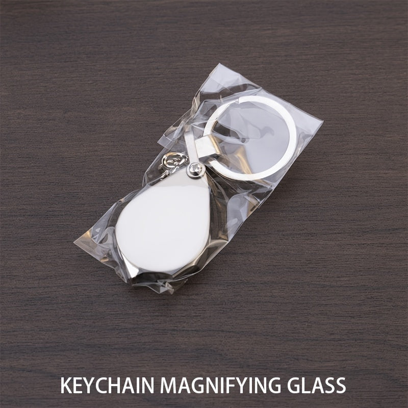 A premium gold keychain magnifying glass with high-definition glass, portable and foldable design perfect for reading small print.