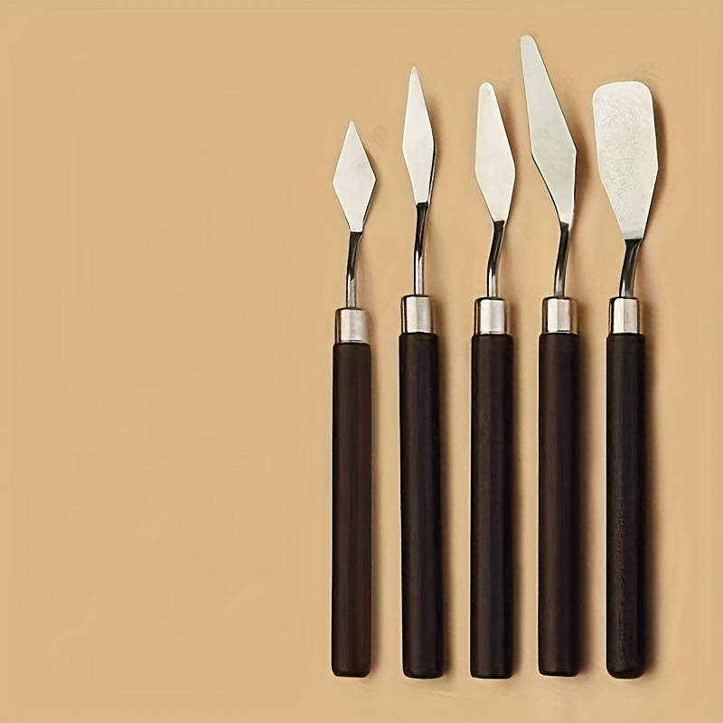 Set of stainless steel palette knives for oil painting, available in various sizes and shapes.