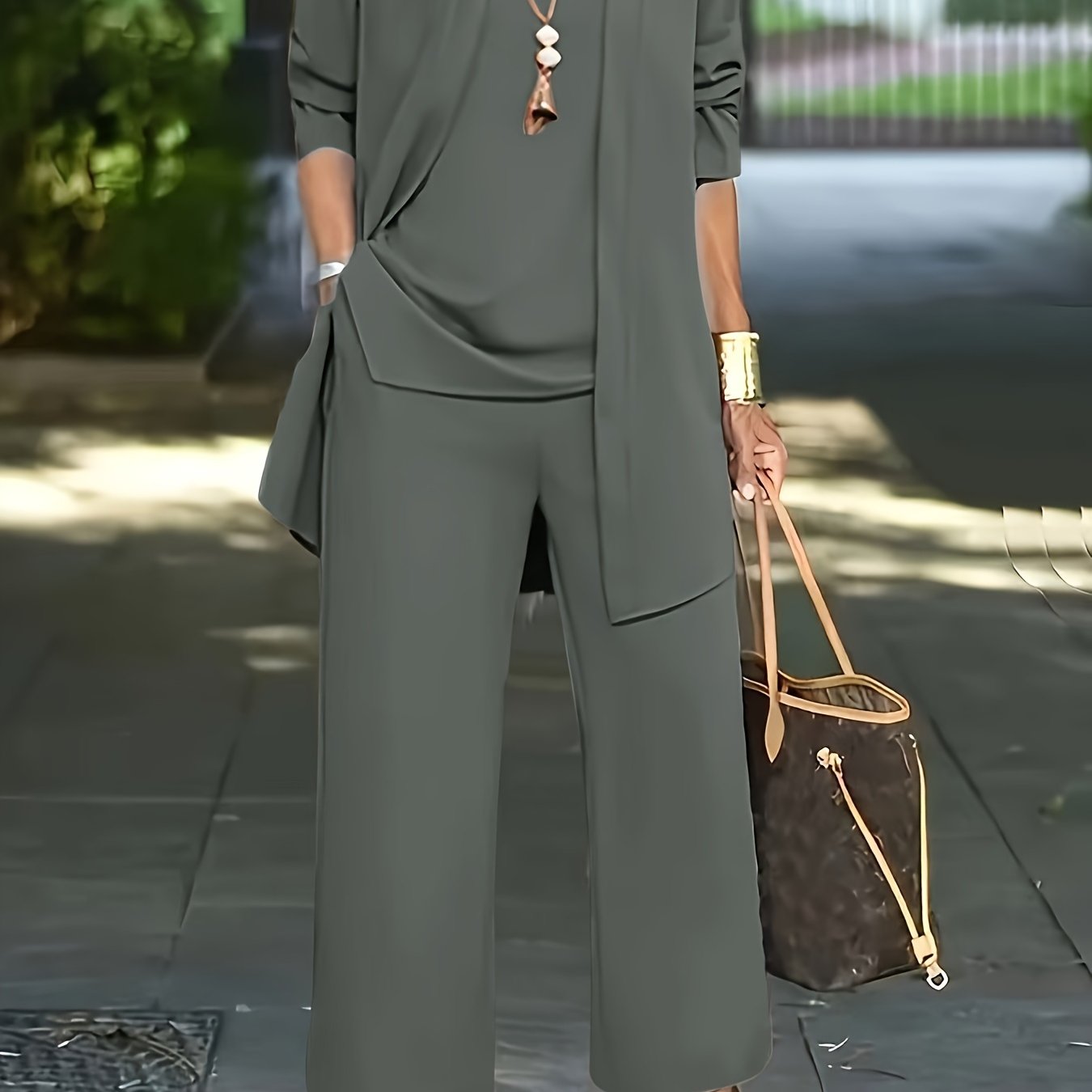 Women's suit set includes solid color split round neck sleeveless vest top, long sleeve open coat, and wide leg pants.