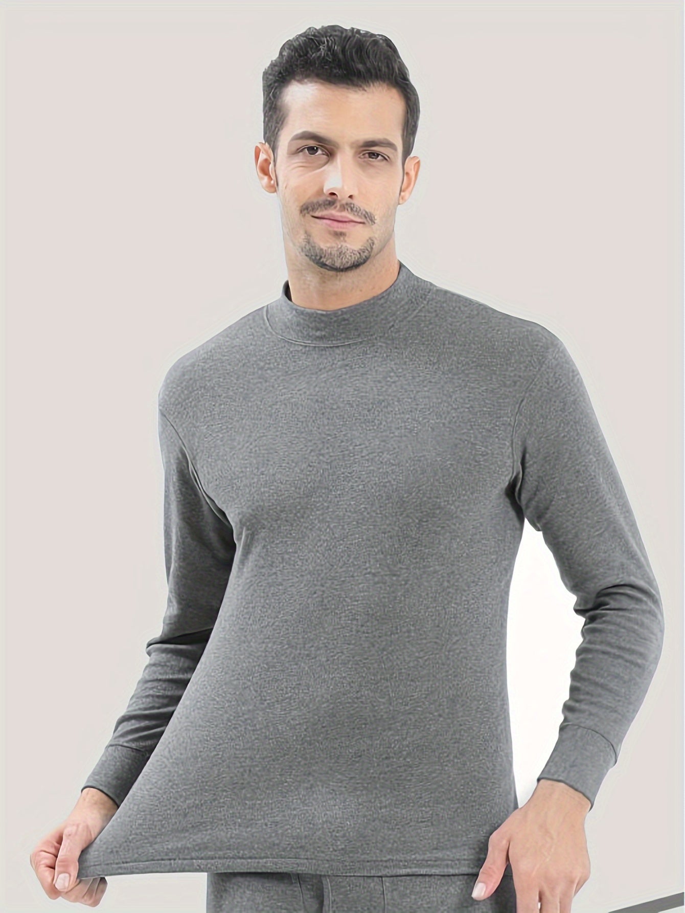 Men's multicolored mid-collared thermal underwear set for warm autumn and winter, including pants and long-sleeved pajama top.