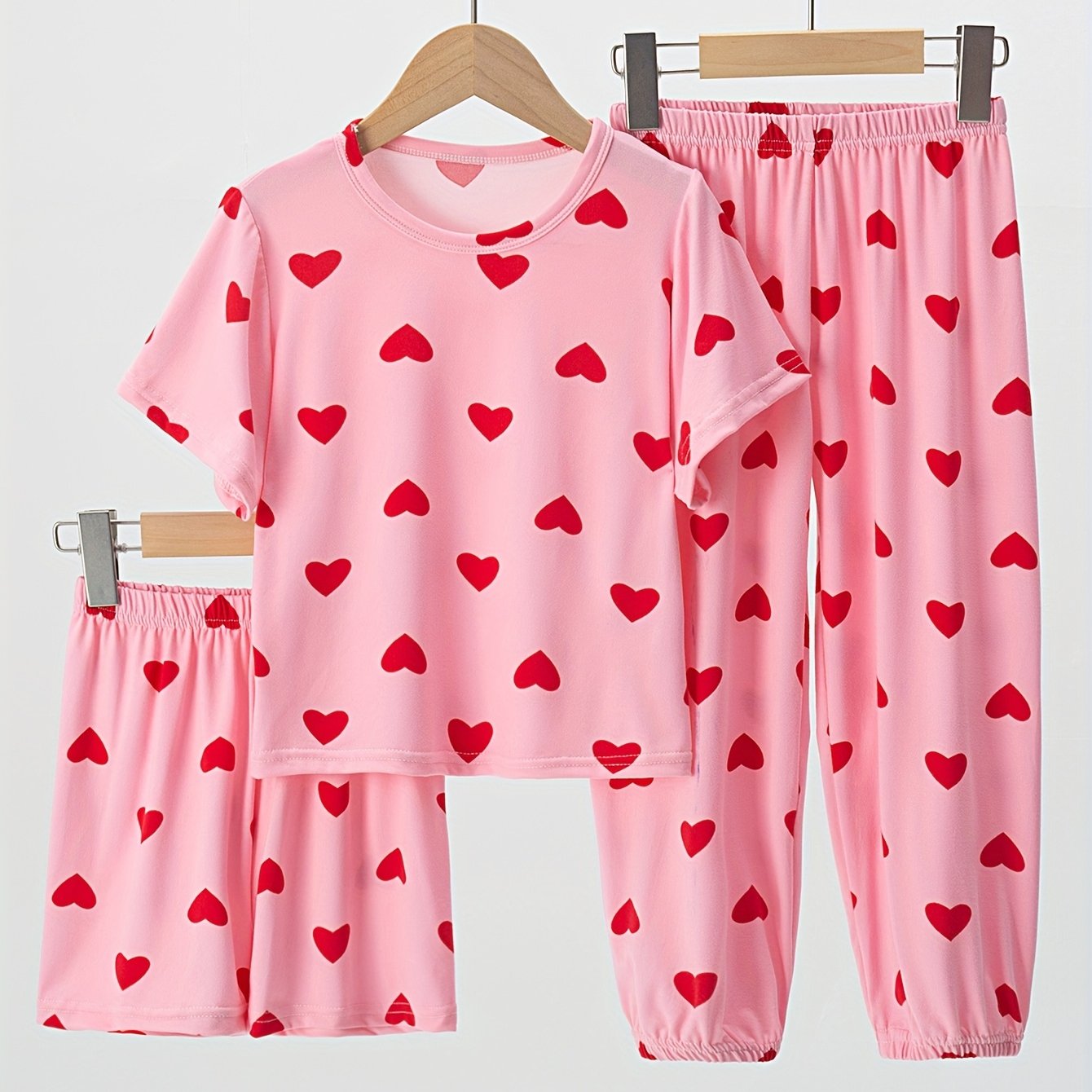 BAIOUNIAO Girls' 3-piece Flame-Resistant Pajama Set in Pink Heart Print, includes Short Sleeve Top, Shorts, and Long Pants, suitable for ages 4-13. Made of breathable and lightweight