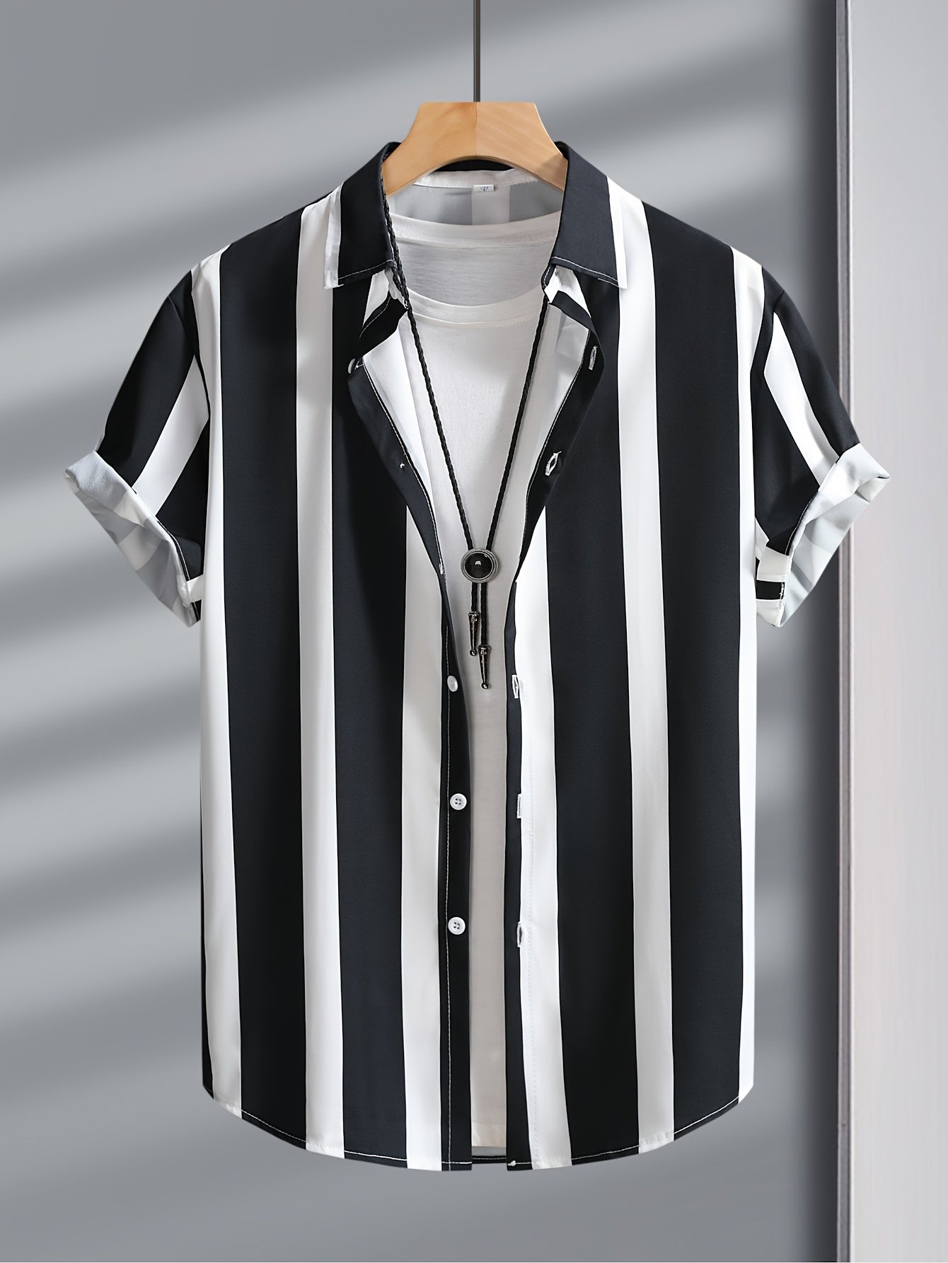 Men's casual outdoor outfit: striped lapel shirt and drawstring pants set.