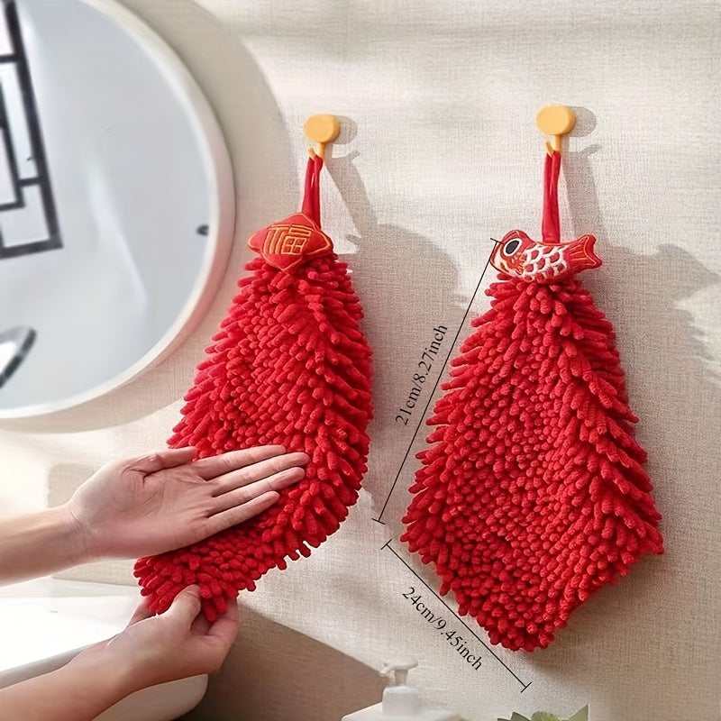 Red chenille hand towel for kitchen and bathroom décor with festive hanging design.