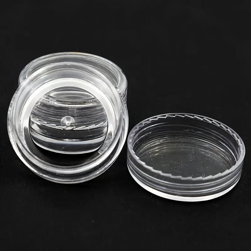 10 clear round plastic containers with secure lids are ideal for storing nail art, glitter, and cosmetic samples. They are lightweight and portable, perfect for bathroom and makeup organization. Ideal for nail care products.