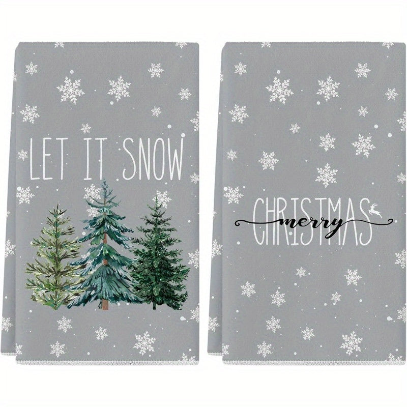 Set of two kitchen towels measuring 45.72*66.04 cm, featuring Merry Christmas and Let It Snow designs. Perfect for adding a festive touch to your home decor during the winter season. Ideal for drying dishes and adding a touch of holiday spirit to your