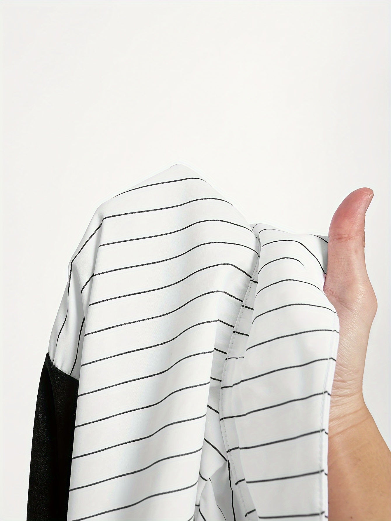 Striped polyester blouse with collar detail, machine washable, perfect for spring/fall.