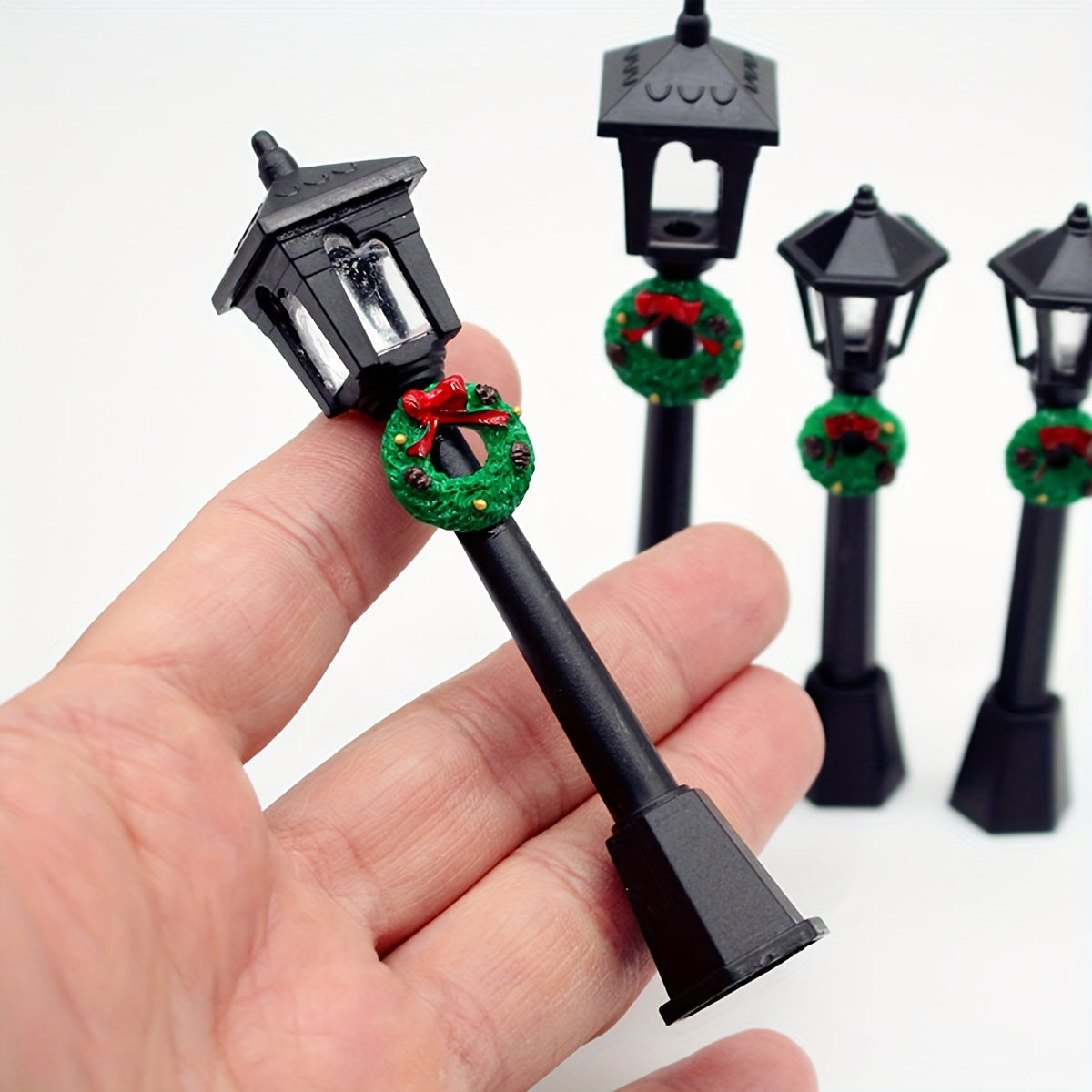 3 Miniature Christmas Lamp Posts with Wreaths, Collectible Seasonal Figurines, Plastic Material, No Electricity Needed