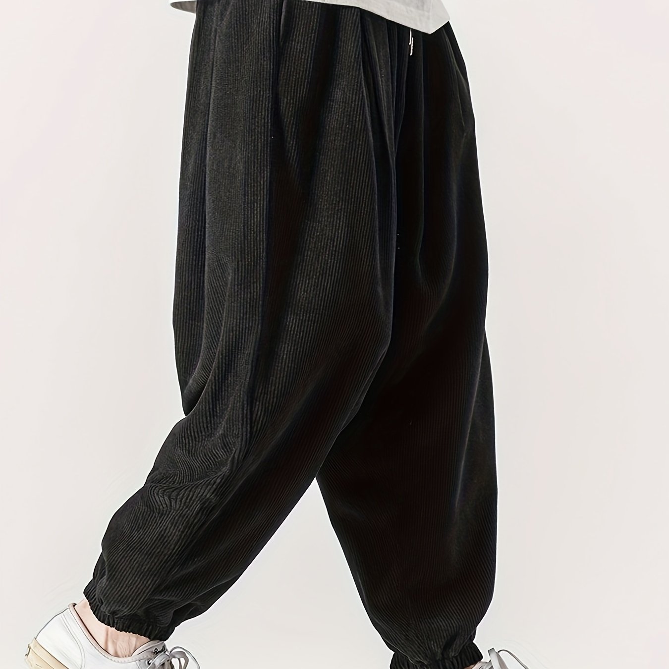 Men's wide leg corduroy pants with drawstring, chic and comfy for spring and fall.