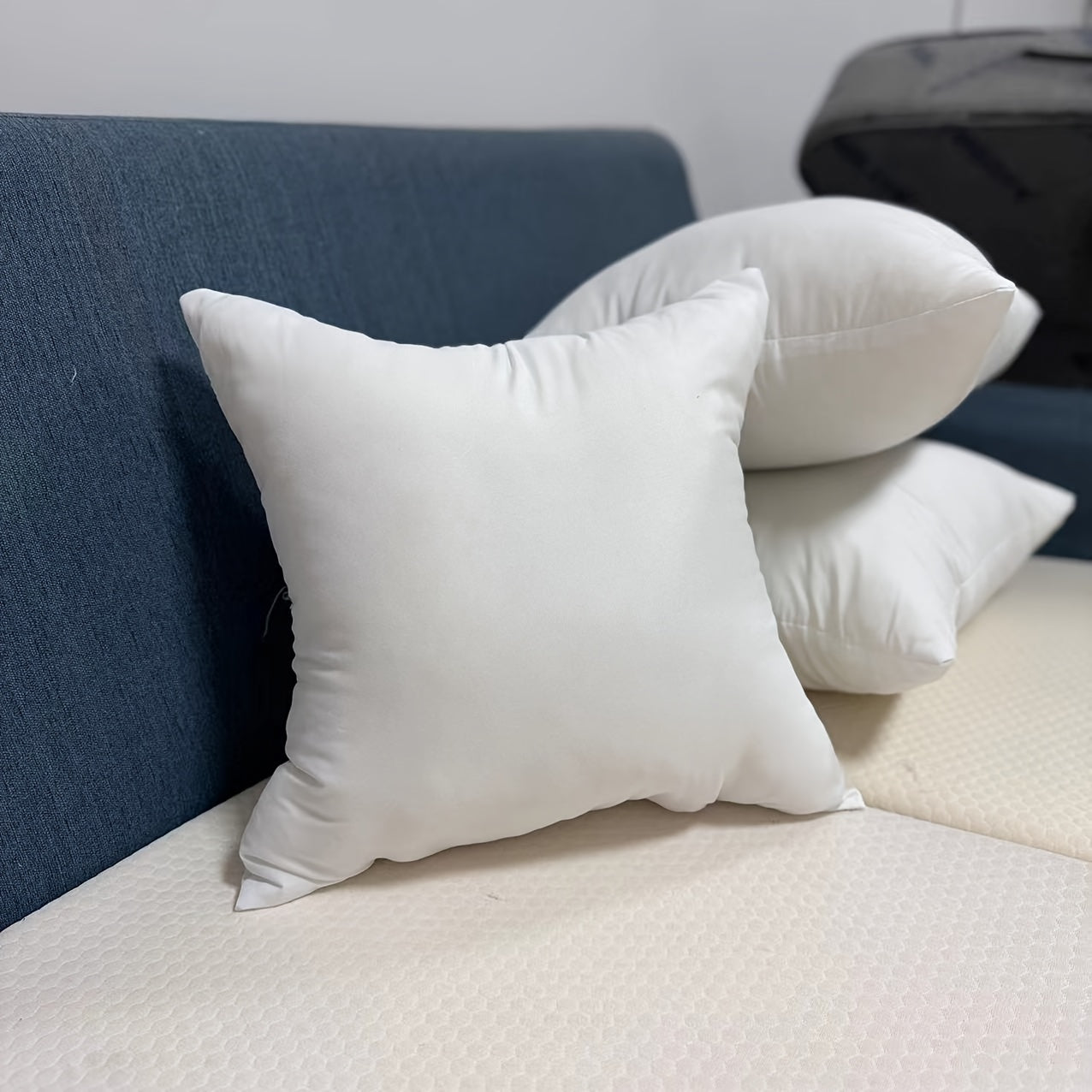 White brushed pillow insert made of breathable soft natural material for a high-quality sleep experience, providing cloud-like comfort.