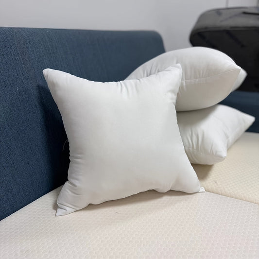 White brushed pillow insert made of breathable soft natural material for a high-quality sleep experience, providing cloud-like comfort.