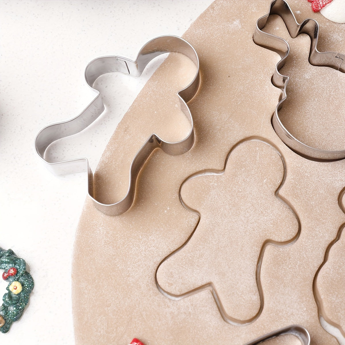 Get into the holiday spirit with our 12-piece Christmas cookie cutter set! Made of durable stainless steel, these festive molds include Christmas-themed shapes perfect for baking holiday cookies, gingerbread, and candy. Add some cheer to your kitchen