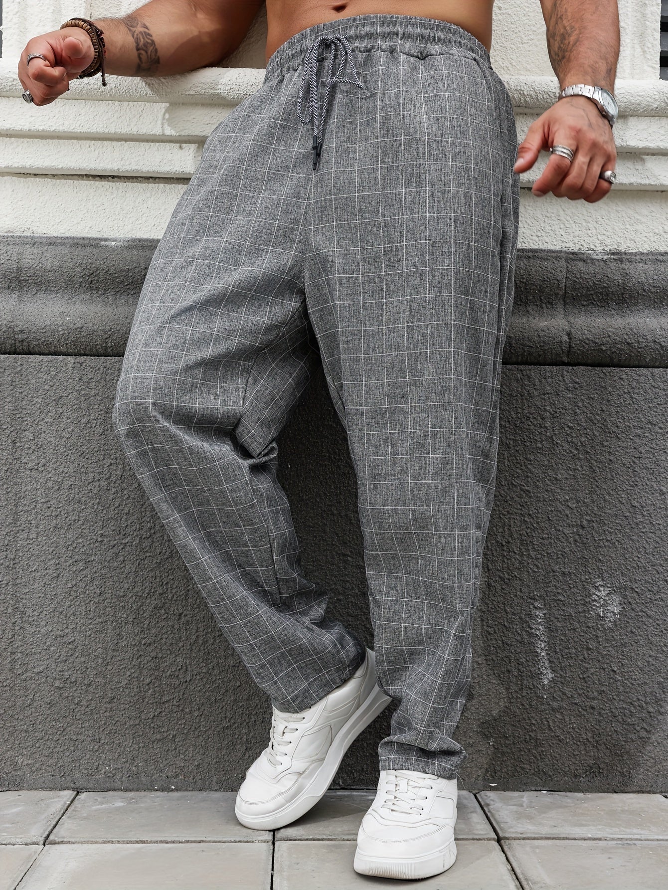 Oversized plaid pants for plus size men in breathable polyester for all seasons.